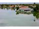 Luxurious waterfront home with a private pool and boat dock, offering stunning views and direct access to the water at 2218 E Anchor Dr, Gilbert, AZ 85234