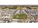 Neighborhood aerial view shows community park space, walking paths, and single Gathering homes at 22491 E Mewes Rd, Queen Creek, AZ 85142