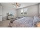 Bedroom features a window with shutters, and a TV on a dresser at 22491 E Mewes Rd, Queen Creek, AZ 85142