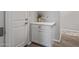Charming entryway with white cabinet and decorative accents near the door at 22491 E Mewes Rd, Queen Creek, AZ 85142