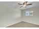 Bedroom with neutral carpet and a ceiling fan at 2424 E Fairfield St, Mesa, AZ 85213