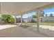 Large covered patio with view of backyard shed and landscaping at 2424 E Fairfield St, Mesa, AZ 85213