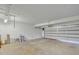 Bright and spacious garage, offering ample parking and storage space with a smooth concrete floor at 2424 E Fairfield St, Mesa, AZ 85213