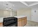 Kitchen features modern appliances and countertops, with an island and open layout at 2424 E Fairfield St, Mesa, AZ 85213