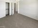 Bedroom featuring closet and neutral carpet at 25038 N 40Th Ave, Phoenix, AZ 85083
