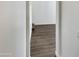 Hallway with hardwood flooring leading into a bright room at 25038 N 40Th Ave, Phoenix, AZ 85083