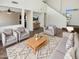 Bright living room featuring a fireplace and modern furniture at 25038 N 40Th Ave, Phoenix, AZ 85083