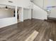 Open concept living room with hardwood floors and natural light at 25038 N 40Th Ave, Phoenix, AZ 85083