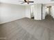 Spacious main bedroom featuring carpet, neutral walls, and an ensuite bathroom at 25038 N 40Th Ave, Phoenix, AZ 85083