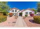 Charming single-Gathering home with a well-manicured front yard and desert landscaping at 2630 E Dolphin Ave, Mesa, AZ 85204