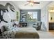 Charming bedroom featuring a unique dinosaur wall decal and playful decor elements at 2942 E Appaloosa Rd, Gilbert, AZ 85296