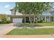 Charming home with a well-manicured lawn, two-car garage, and attractive landscaping at 2942 E Appaloosa Rd, Gilbert, AZ 85296