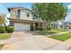 Charming home with a well-manicured lawn, two-car garage, and attractive landscaping at 2942 E Appaloosa Rd, Gilbert, AZ 85296