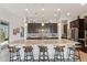 Kitchen with large island, seating, pendant lighting, and modern cabinetry at 2942 E Appaloosa Rd, Gilbert, AZ 85296
