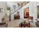 Spacious living room with a staircase and an open floor plan at 2942 E Appaloosa Rd, Gilbert, AZ 85296