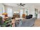 Inviting living room with modern furniture and a large TV for entertainment at 2942 E Appaloosa Rd, Gilbert, AZ 85296