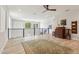 Spacious loft area with modern railing, wood floors and contemporary decor create a welcoming space at 2942 E Appaloosa Rd, Gilbert, AZ 85296