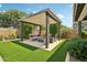 Outdoor pergola in backyard featuring cozy seating area, perfect for outdoor relaxation and entertaining guests at 2942 E Appaloosa Rd, Gilbert, AZ 85296