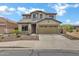 Charming two-story home featuring a tile roof, desert landscaping, and a two car garage at 3033 W Redwood Ln, Phoenix, AZ 85045