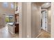 Bright eat-in kitchen features granite counters, stainless faucet, and backyard access at 3033 W Redwood Ln, Phoenix, AZ 85045