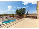 Overhead view of a spacious balcony overlooking a serene pool and the backyard at 309 W Settlers Trl, Casa Grande, AZ 85122
