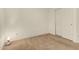 Bedroom with carpeted floors and closet access at 309 W Settlers Trl, Casa Grande, AZ 85122