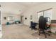 Multi-purpose bonus room with office setup and comfortable seating, offering great flexibility at 309 W Settlers Trl, Casa Grande, AZ 85122