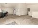Large bonus room with neutral carpeting and ample space for various activities and furniture at 309 W Settlers Trl, Casa Grande, AZ 85122