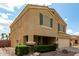 Inviting two-story home featuring a two-car garage, desert landscaping, and a covered front porch at 309 W Settlers Trl, Casa Grande, AZ 85122