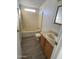 Bathroom featuring a tub-shower combo, neutral cabinets, and updated flooring for a clean and comfortable experience at 320 E Mckellips Rd # 152, Mesa, AZ 85201