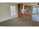 Modern kitchen featuring stainless steel appliances, and a connected eat-in bar area at 320 E Mckellips Rd # 152, Mesa, AZ 85201