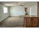 Bright living room featuring neutral carpeting, plenty of natural light, and an open floorplan at 320 E Mckellips Rd # 152, Mesa, AZ 85201