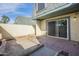 Brick-paved backyard patio featuring a sliding door and block wall at 3222 W Royal Palm Rd, Phoenix, AZ 85051