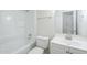 A clean, well-lit bathroom features a shower-tub combo and a modern vanity at 3222 W Royal Palm Rd, Phoenix, AZ 85051
