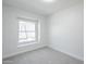 Cozy carpeted bedroom featuring a window at 3222 W Royal Palm Rd, Phoenix, AZ 85051