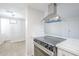 This bright kitchen offers modern appliances, white countertops, and sleek, clean finishes at 3222 W Royal Palm Rd, Phoenix, AZ 85051