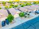 Aerial view of a single-Gathering home with a two-car garage, tile roof, and desert landscaping at 33105 N Double Bar Rd, San Tan Valley, AZ 85144