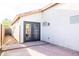Back patio with brick pavers and access to the house through double doors at 33105 N Double Bar Rd, San Tan Valley, AZ 85144