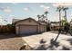 Charming single-Gathering home with three-car garage, desert landscaping, and a welcoming curb appeal at 341 E Constitution Dr, Gilbert, AZ 85296