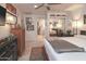 Spacious bedroom featuring tiled floor, ceiling fan, and ample natural light at 4009 S Siesta Ln, Tempe, AZ 85282