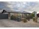 Lovely single-story home with gray brick exterior and inviting landscaped front yard at 4009 S Siesta Ln, Tempe, AZ 85282