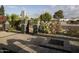 Landscaped front yard with fire pit, plants, and gated entry at 4009 S Siesta Ln, Tempe, AZ 85282