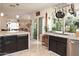 Bright kitchen featuring granite countertops, modern sink, and stainless steel appliances at 4009 S Siesta Ln, Tempe, AZ 85282