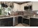 Well-equipped kitchen with granite countertops and stainless steel appliances at 4009 S Siesta Ln, Tempe, AZ 85282