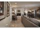 Open-concept living area with fireplace and tiled floors at 4009 S Siesta Ln, Tempe, AZ 85282