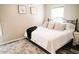 Comfortable bedroom with plush pillows, neutral decor, and soft carpet at 4313 E Jasper Dr, Gilbert, AZ 85296