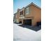 Two-story townhome with two garage doors at 4313 E Jasper Dr, Gilbert, AZ 85296
