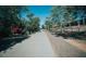 Tree-lined walking path offers a serene escape into nature, perfect for walking, jogging or biking at 4313 E Jasper Dr, Gilbert, AZ 85296