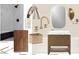 This guest bathroom features a modern vanity, shower tile layout, and sleek black fixtures at 4729 E Arcadia Ln, Phoenix, AZ 85018