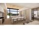 Open-concept kitchen with white marble countertops, double islands, and ample counter seating with a bright and airy atmosphere at 4729 E Arcadia Ln, Phoenix, AZ 85018